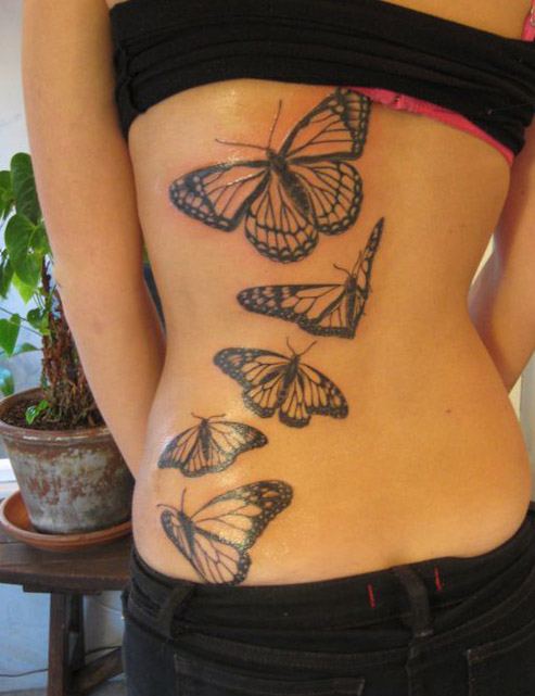 tatuajes mariposas espalda baja caderas pelvis 2 - tatuajes de mariposas