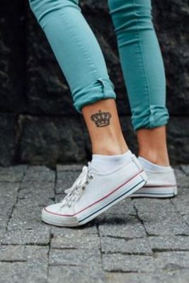 Closeup of teen with a tattoo on her leg