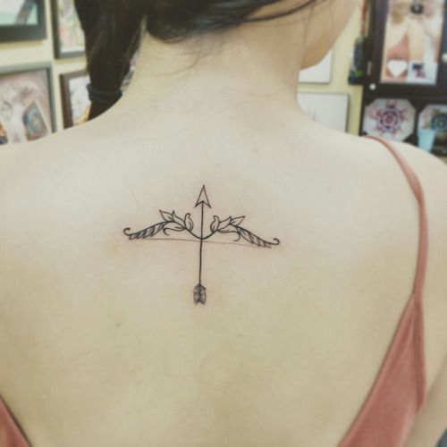 flechas para mujeres - tatuajes de guitarras