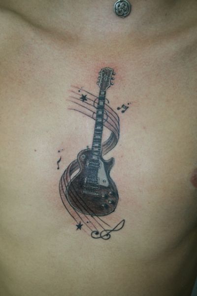 guitarras y notas musicales 5 1 - tatuajes de guitarras